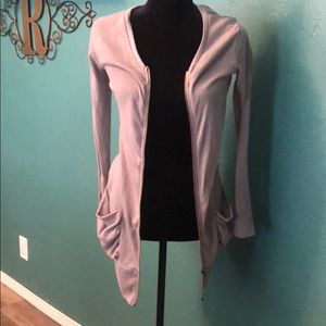 Gray zipper pocket in cardigan